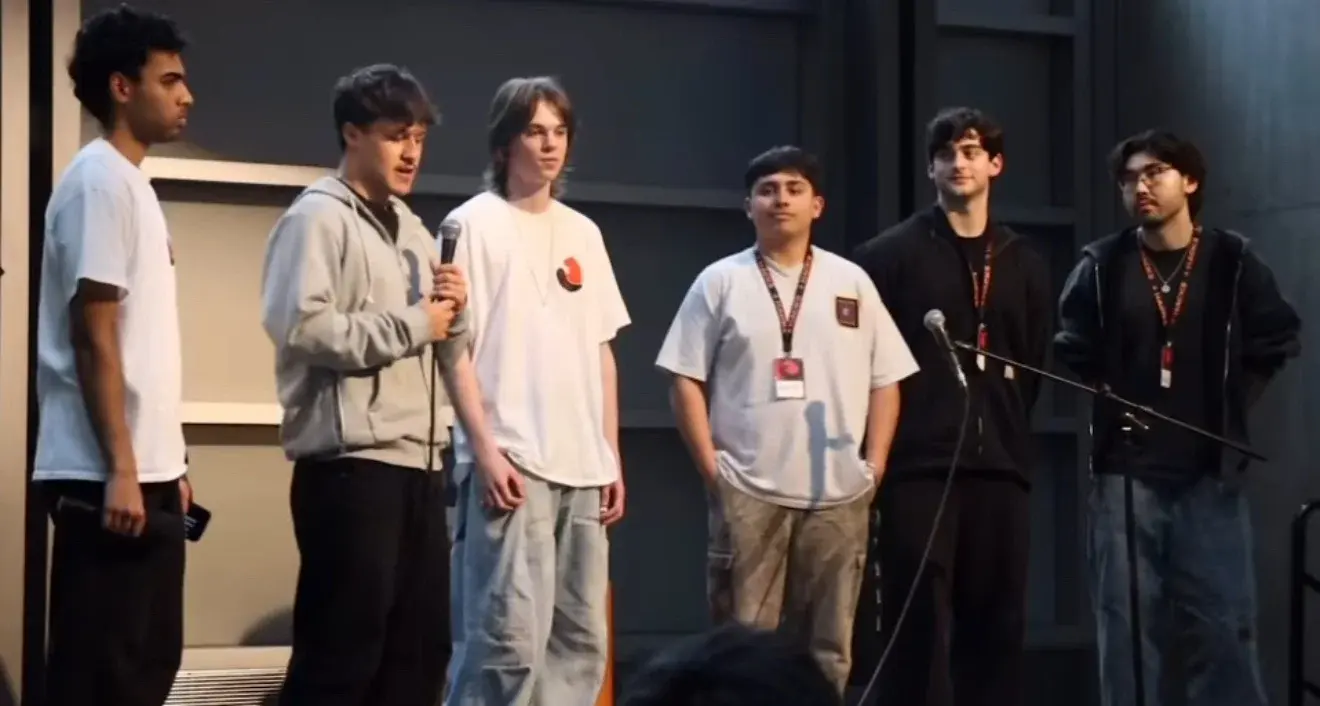 On stage with the team at BeaverHacks after the win